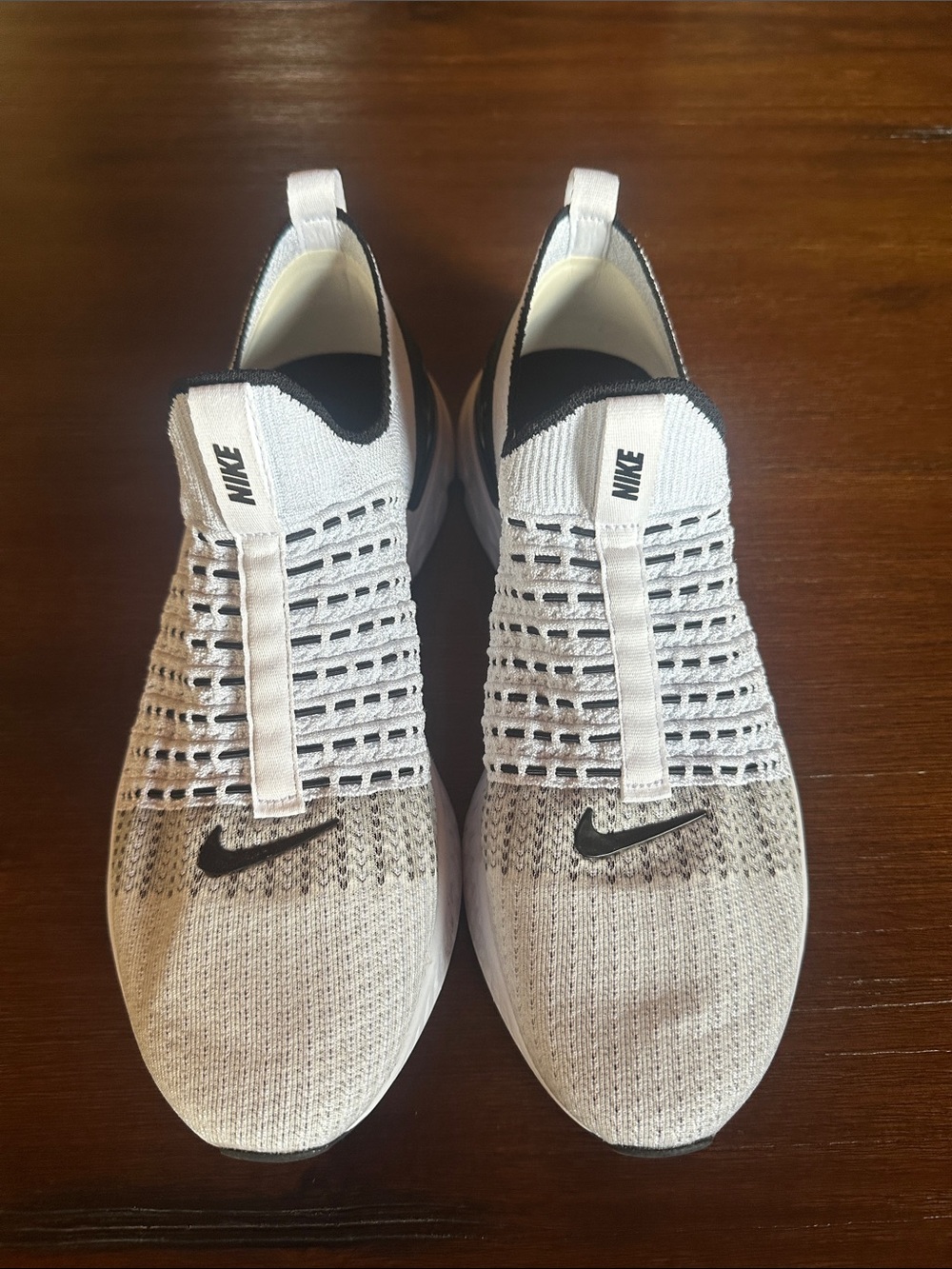 Nike White and Black Slip-On Knit Athletic Sneakers
